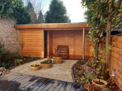 Tuinproject van Lariks hout. Foto: Silke Zandstra (Tuinzijde). Tuinproject van Lariks hout. Foto: Silke Zandstra (Tuinzijde).